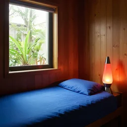 a room with a blue bed in the corner, with a window next to the bed, plants in the window, sunlight coming through the window, wooden walls and a lava lamp, light reflections, professional photo