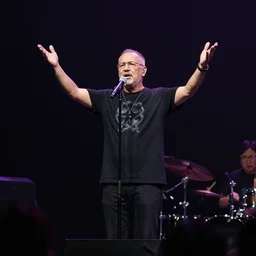 a pastor at a rock concert