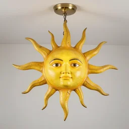 chandelier in the shape of a sun with yellow accents designed by salvador dali