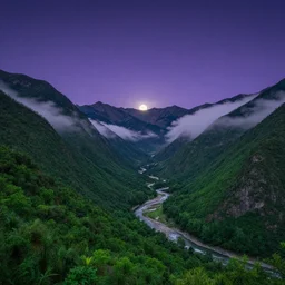 Panoramic photo where the mountains are towering over the valley below their peaks shrouded in mist. The moon is just peeking over the horizon and the sky dark purple. The sky is blanketed with shiny stars. The river is winding its way through the valley and the trees are a vivid green