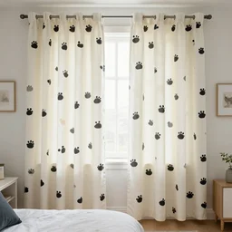 a bedroom with poo poo curtains