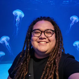 a chubby entrepreneur with long dreadlocks and trendy glasses takes a smiling selfie in front a large aquarium filled with neon jellyfish, high detail, full focus, time magazine 2 0 2 2