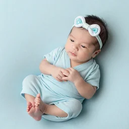 beautiful photography of newborn hindi, pastel colors, hyper realistic, 8 0 mm, studio lighting
