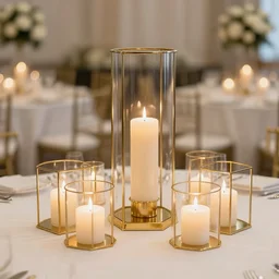 minimilast ultra modern wedding centerpieces featuring candles and golden terrariums