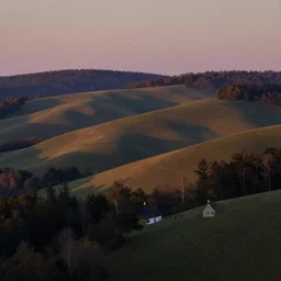 rolling hills and a house on the edge of a forest at dusk. perspective landscape. strong shadows. deep colorful soft gradients, and translucence. by norman rockwell and eyvind earle