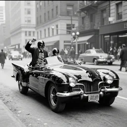 old black and white photo, 1 9 1 3, depicting batmobile from dark knight rampaging through the bustling streets of new york city, historical record