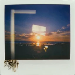 expired polaroid of unknown objects, scratches, oxidised, refraction, light leaks, in the style of richter and rothko