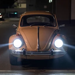 volkswagen beetle with laser beams on headlights