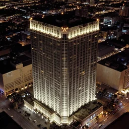 isometric view of Las Vegas skyscraper at night, detailed, dirty, filth and grime, aerial view, photography 1975
