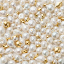 white pearl and shiny gold random patterns