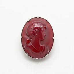 ruby red cameo brooch, 8k product photo, isolated on a pure white background, centered, entire object in frame, sharp focus, soft studio lighting