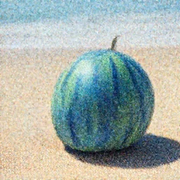 a blue watermelon on a beach.