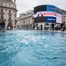 Piccadilly Circus flooded with crystal clear water, 4K photo