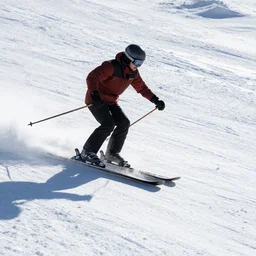 photo of a guy skiing, the ground is all ice - cream