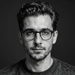 black and white head shot, studio photograph of a male symmetrical handsome andrea belluci wearing glasses the painter artist, casual clothes, anxiety and depression, intricate, elegant, highly detailed, hyper realistic, dark background, flickr, smooth, 4 k, 3 0 0 dpi, sharp focus, shot by canon