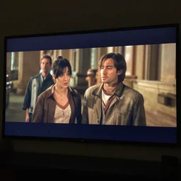 still from a movie on a tv screen