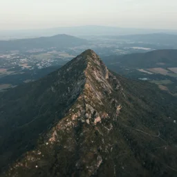 majestic landscape, realistic, atmospheric, tilt shift, aerial photo, drone, 8 k, octane render, unreal engine