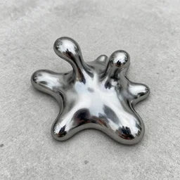 weird amorphous chrome thingamajig on the concrete