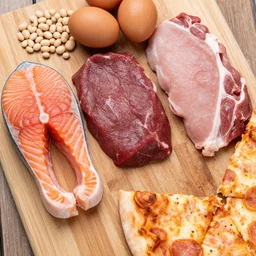 Raw salmon + raw beef + raw pork + raw eggs + raw beans + squished pizza