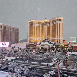 an award winning landscape photo of the Las Vegas strip under heavy snow