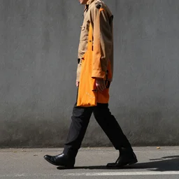 an orange, man walking