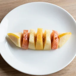 beautiful photo of fruit pieces arranged to shape a rowing boat on a white plate, dslr