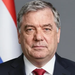 viktor orban with highly detailed face wearing five ties