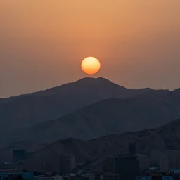 damavand mountain in the morning with an orange sun in sky, national geography photo, professional photography