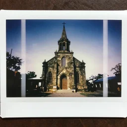 scorched church building, polaroid