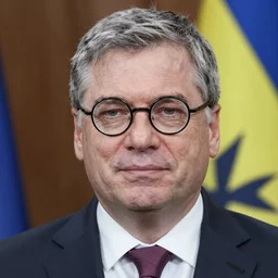 photo of viktor orban wearing hip round glasses by peter lindbergh