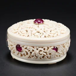 carved ivory box with inlaid rubies, studio photography, black background