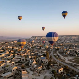 aerial photography, abandoned city, hot air balloons, flying, dusk