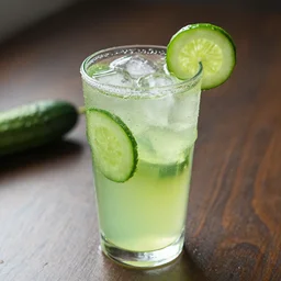 a cucumber drink on a table, water condensation beads