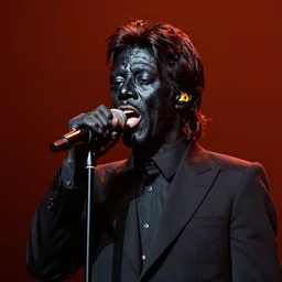 mick jagger doing black - face