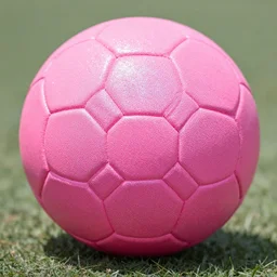 picture of a pink handball covered with a glittering and sparkling shiny powder, canon 5 0 mm, 4 k, hdr