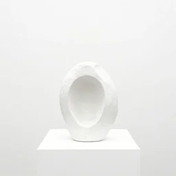 a minimal white photograph of the sculpture of an object on a pedestal, white background, white washed, low contrast, over exposed, contemporary art