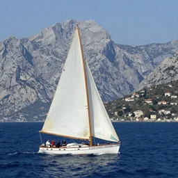 Sailing in the Aegean Sea by Mount Athos in the style of Nikolai Roerich