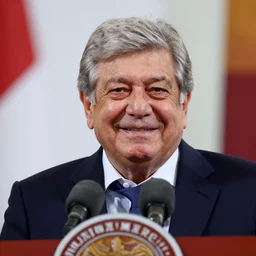 photograph of AMLO smiling
