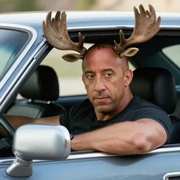 Vin Diesel wearing moose antlers staring out of his car, movie scene from fast and the furious