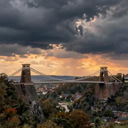 a landscape painting of clifton suspension bridge, bristol, united kingdom, sunset, stormy sky, dramatic lighting, epic scene, hyper realistic, highly detailed, photorealistic