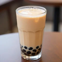 a 4 k photorealistic photo close up of a glass of boba tea on a table