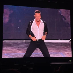 rick astley's dance is shown on every screen in the world
