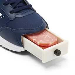 sports shoe with built - in tiny sliding drawer, lunch meat inside, product photo