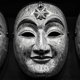 macro of tyrolean and alpine folk folklore mask, 1 9 2 0 analog photography, black and white, grainy, dark