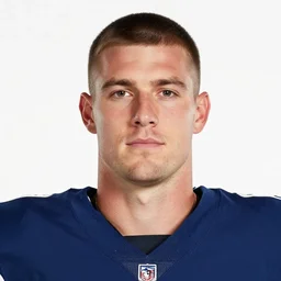 headshot of a man on a white backdrop, quarterback cole briarson, aged 4 6 years old, a stock photo by mac conner, associated press photo