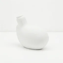 a minimal white sculpture of a common everyday object, white background, white washed, low contrast, over exposed, evanescent white on white, contemporary art
