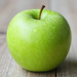 a beautiful photo of a green apple, saturated colors
