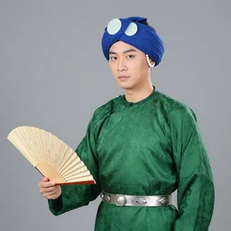 he wears a blue gauze turban that grabs the corners, two white jade circles at the back of his head with beaded temple rings, a single - collar green luo tuanhua shirt, a double - tailed turtle - back silver belt around his waist, and a pair of kowtow heads. chao - like soap boots, holding a folding paper nishikawa fan in his hand