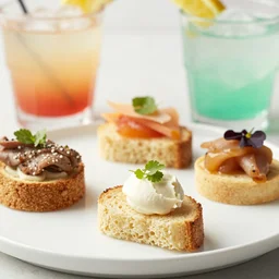 close up, perfect appetizer and cocktail pairings for summer. professional high quality food photography