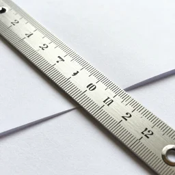 cross section of a scale rule on a piece of paper with the words arcsoc 2022